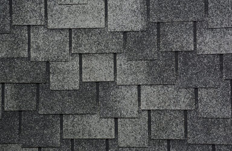 Asphalt Shingles Photo. Close Up View On Asphalt Roofing Shingle